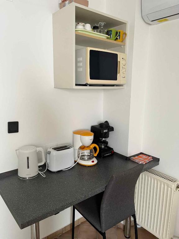 Kuchyňa alebo kuchynka v ubytovaní Apartment Gyenesdias 19