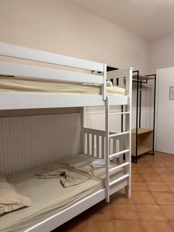 Postel nebo postele na pokoji v ubytování Guroal Holiday House