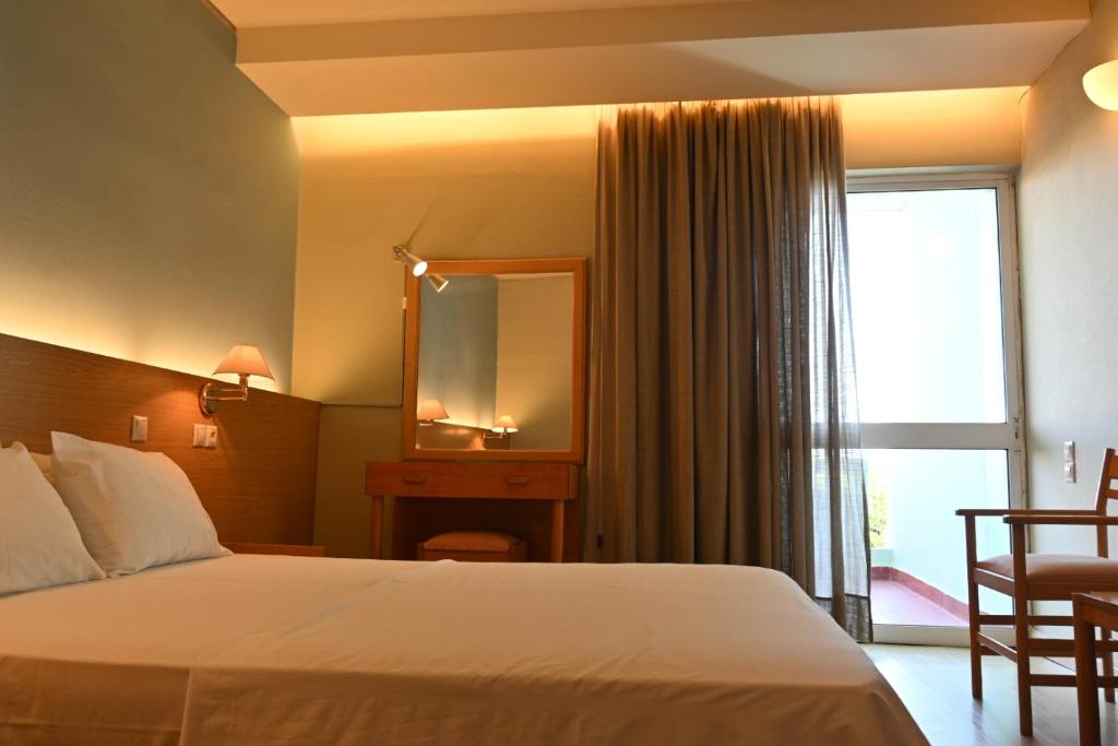 Postel nebo postele na pokoji v ubytování Angel Hotel