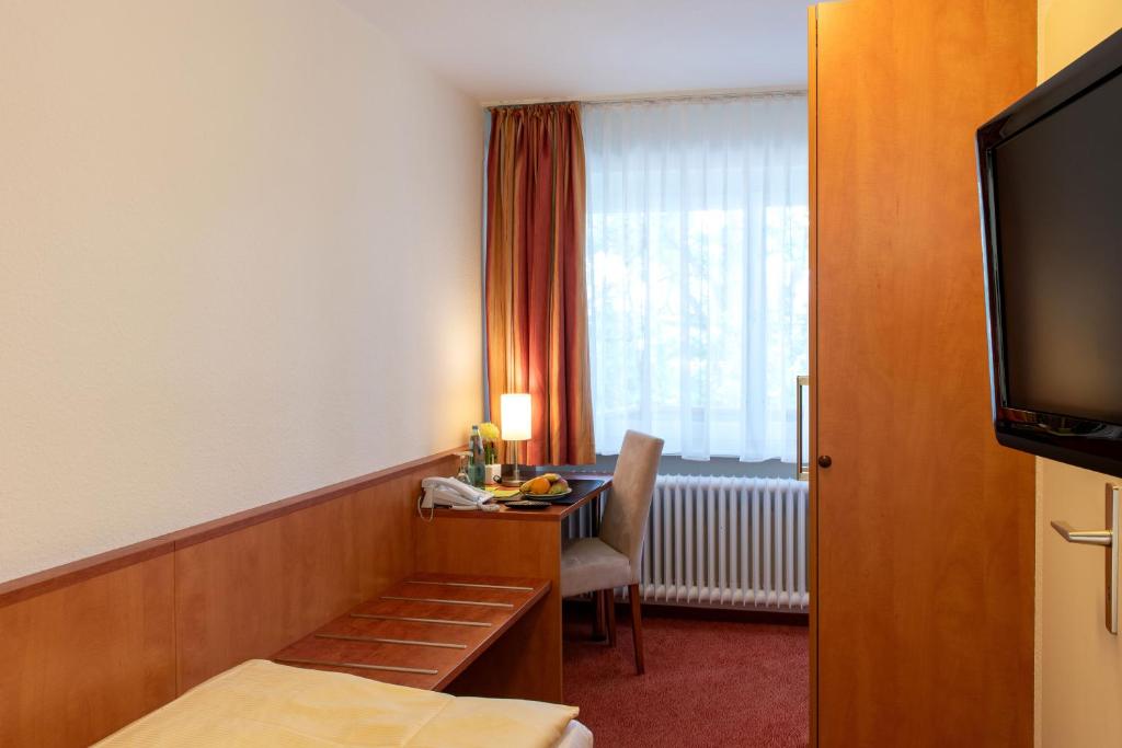 TV a/nebo společenská místnost v ubytování Hotel Fernblick
