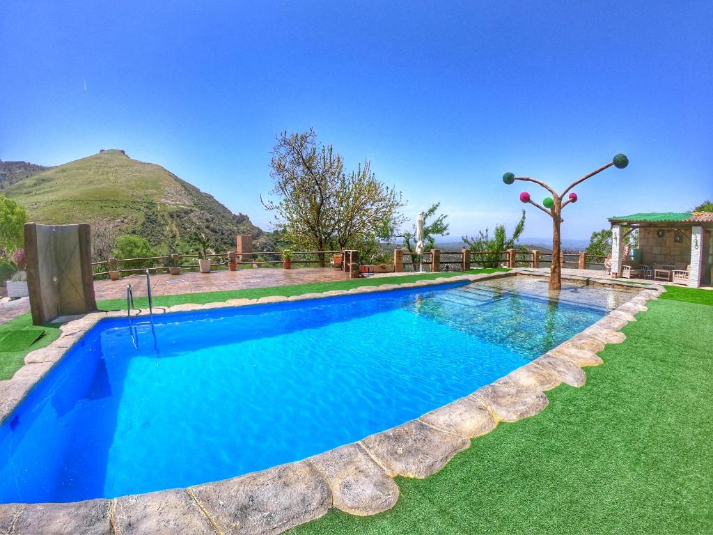 Bazén v ubytovaní Cazorla Paraíso Resort alebo v jeho blízkosti