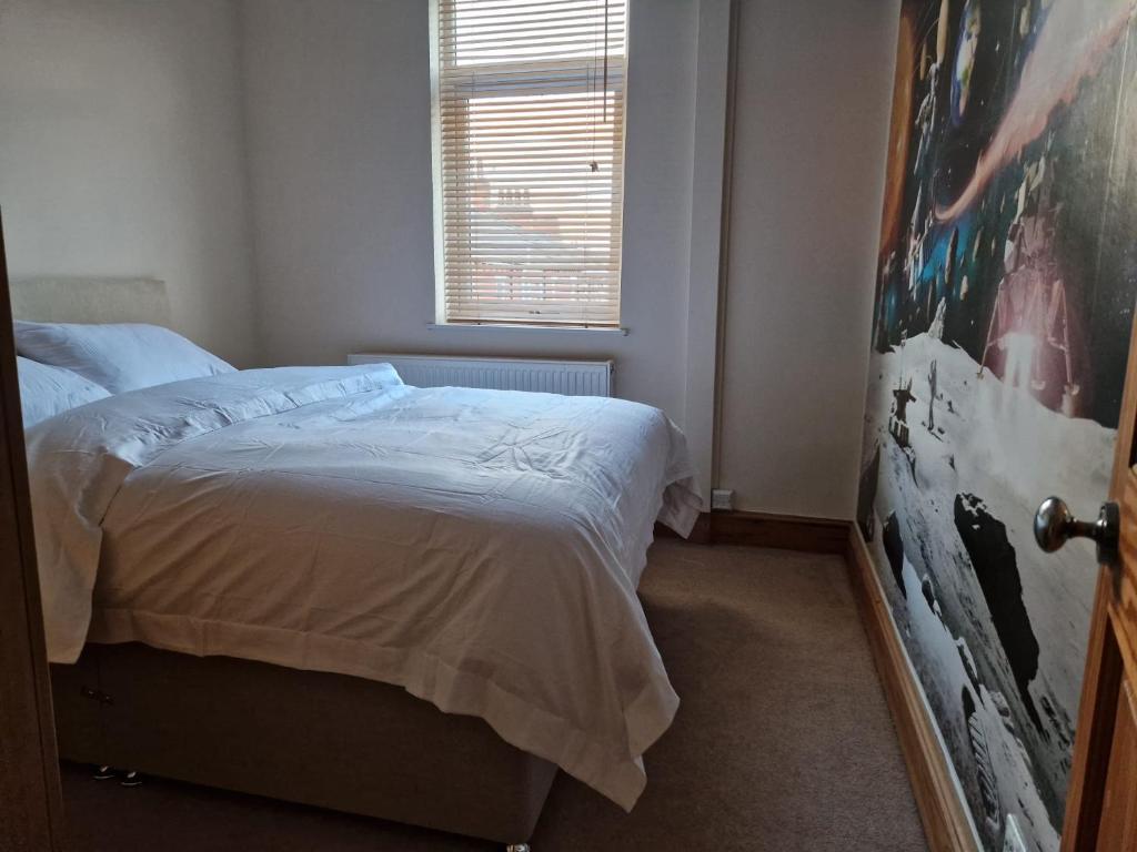 Ένα ή περισσότερα κρεβάτια σε δωμάτιο στο Decent Rooms in Wakefield