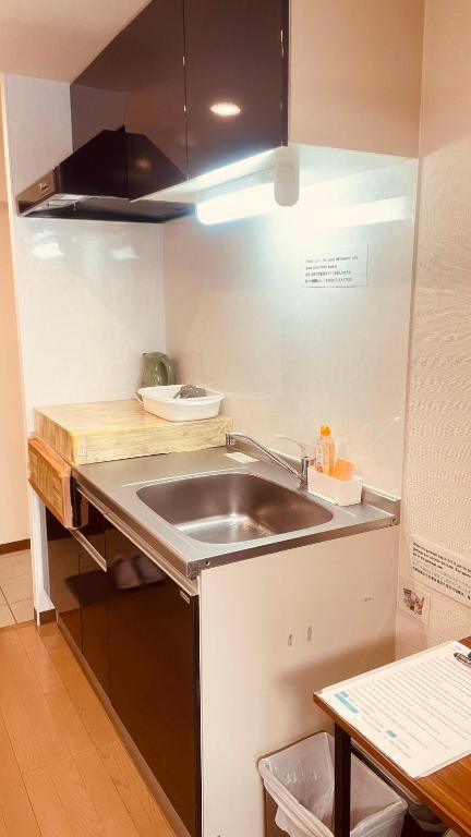 Kuchyň nebo kuchyňský kout v ubytování SkyHotel Ryogoku 駅徒歩4分