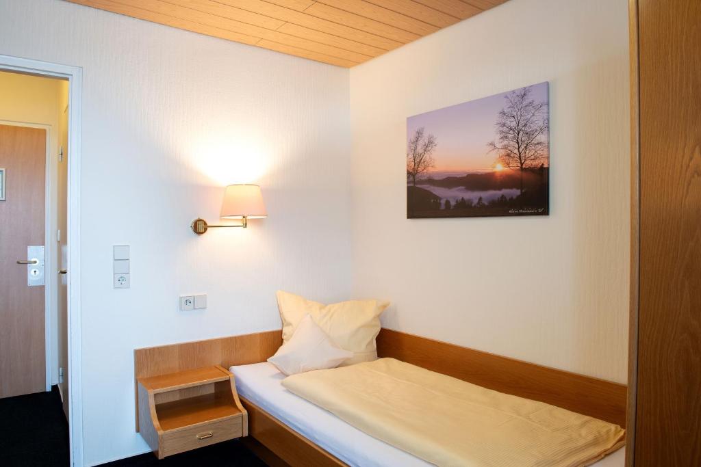 Postel nebo postele na pokoji v ubytování Hotel Fernblick