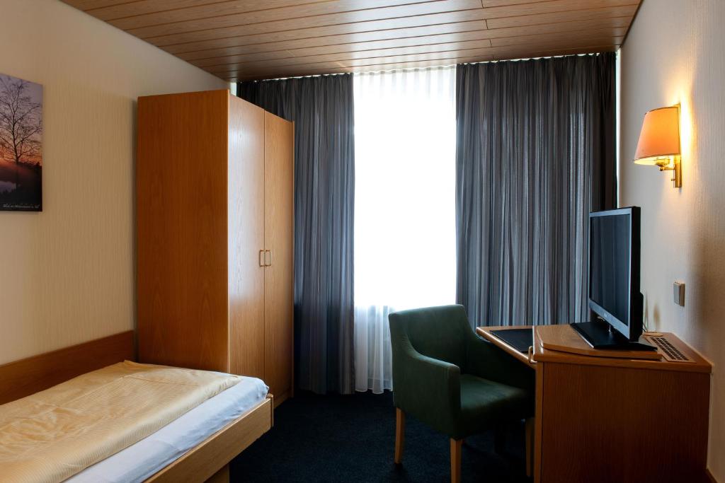 Postel nebo postele na pokoji v ubytování Hotel Fernblick