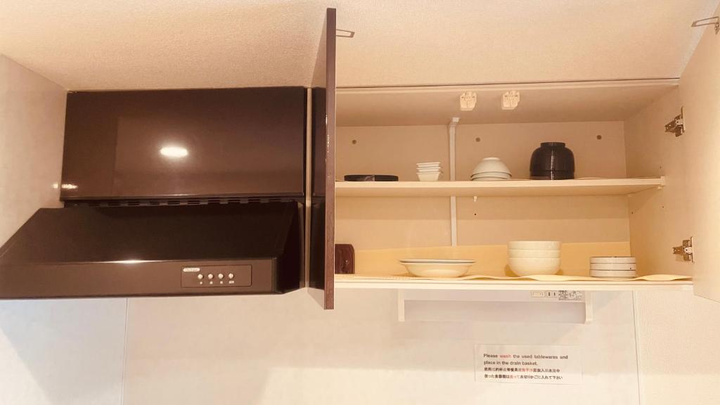Kuchyň nebo kuchyňský kout v ubytování SkyHotel Ryogoku 駅徒歩4分