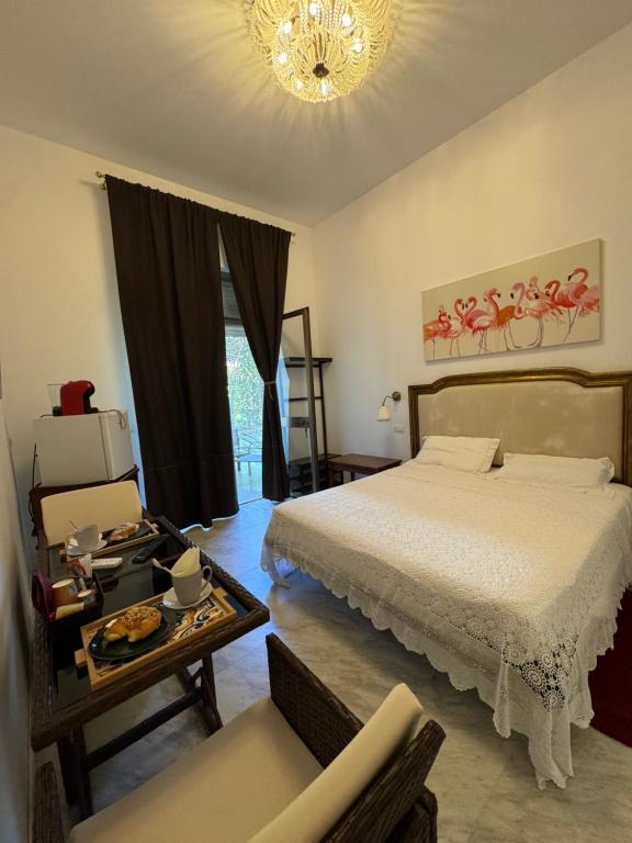 Postel nebo postele na pokoji v ubytování La Gran Dama