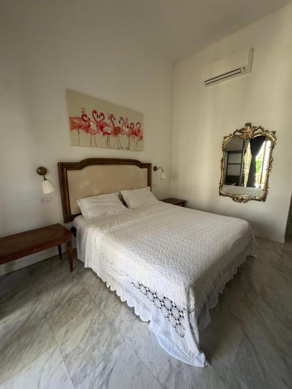 Postel nebo postele na pokoji v ubytování La Gran Dama