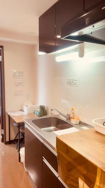 Kuchyň nebo kuchyňský kout v ubytování SkyHotel Ryogoku 駅徒歩4分