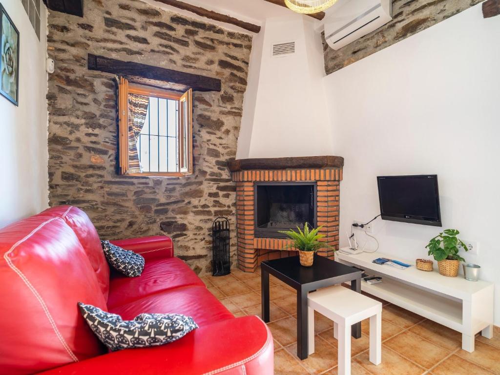 Telewizja i/lub zestaw kina domowego w obiekcie Casa Crisantemo with sea view and pool in Adra