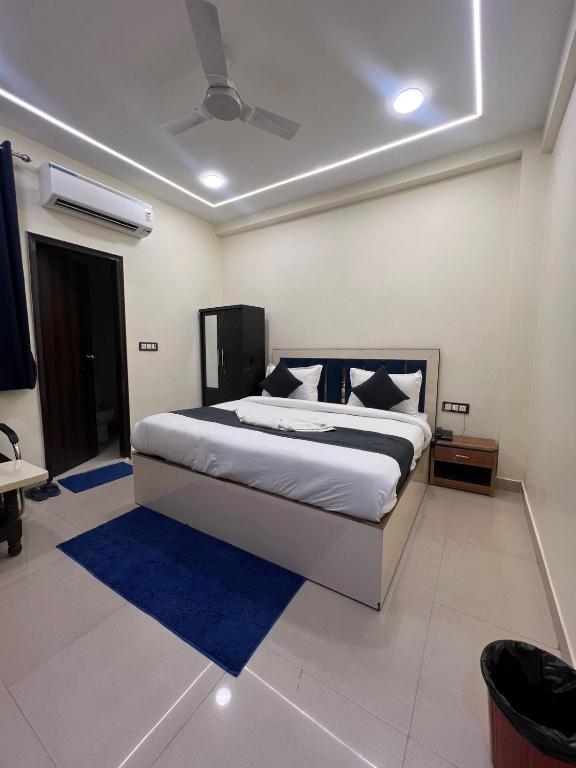Ένα ή περισσότερα κρεβάτια σε δωμάτιο στο Hotel Hayat Inn