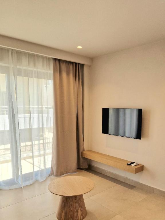 TV a/nebo společenská místnost v ubytování NAMI Seaside