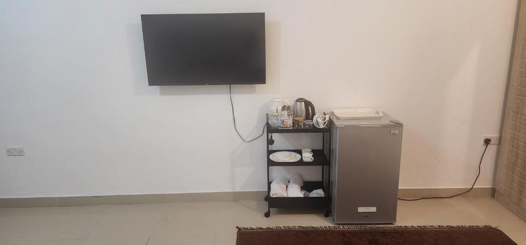 Příslušenství pro přípravu čaje a kávy v ubytování Gisa private hostel room