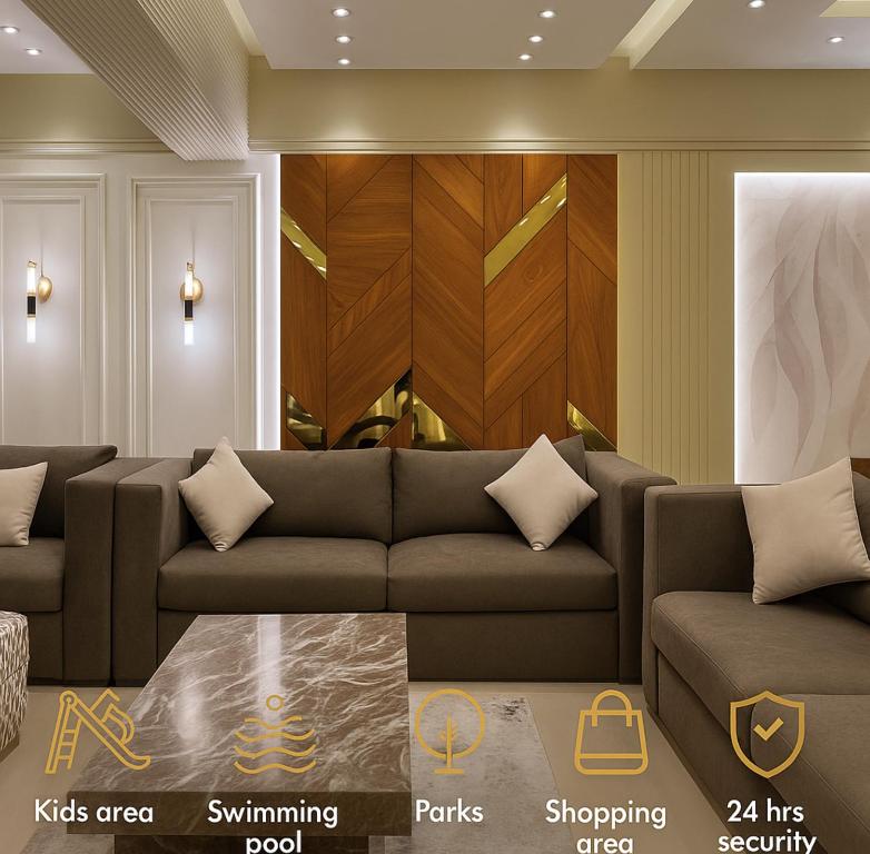 a living room with a couch and a wooden wall at Porto New Cairo - بورتو نيو كايرو in Cairo