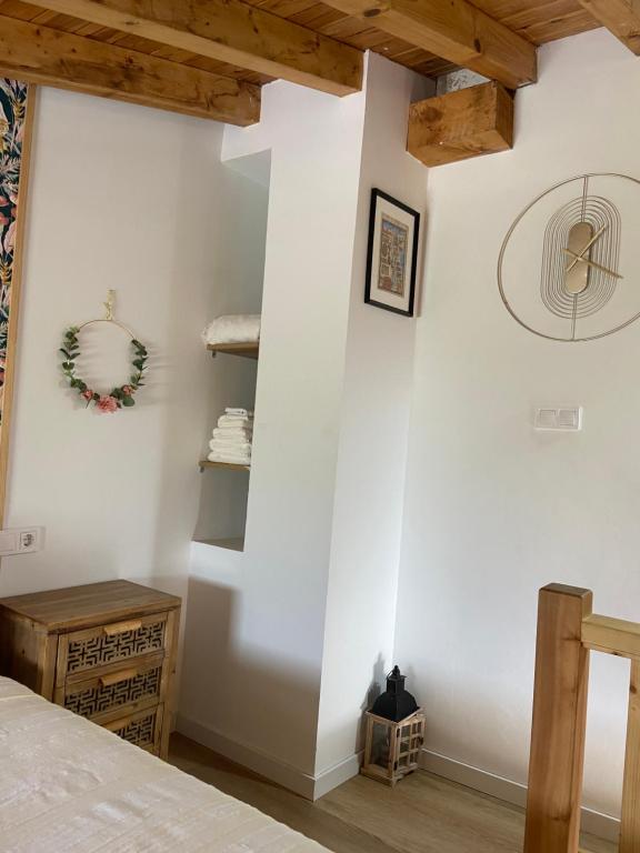 Postel nebo postele na pokoji v ubytování Posada La Fontana