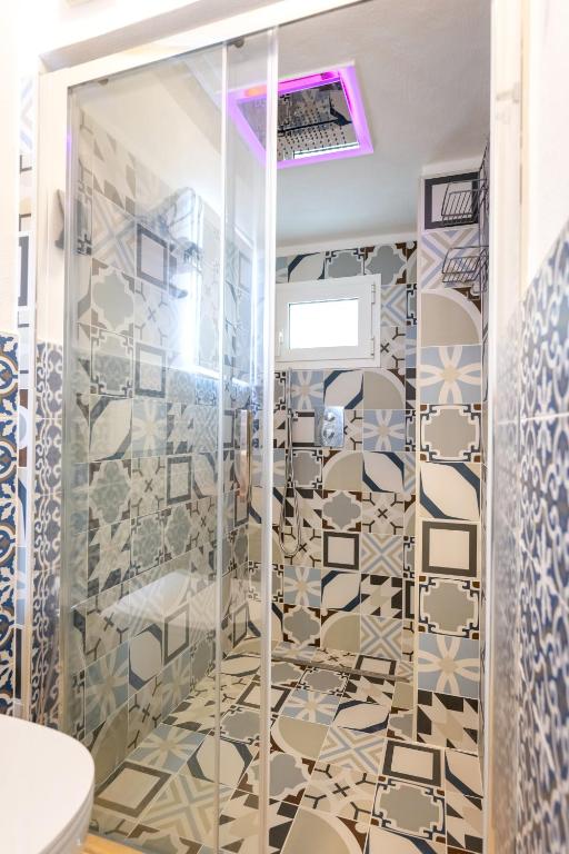 Koupelna v ubytování Le Perle di Bà - Suites with Jacuzzi in Polignano