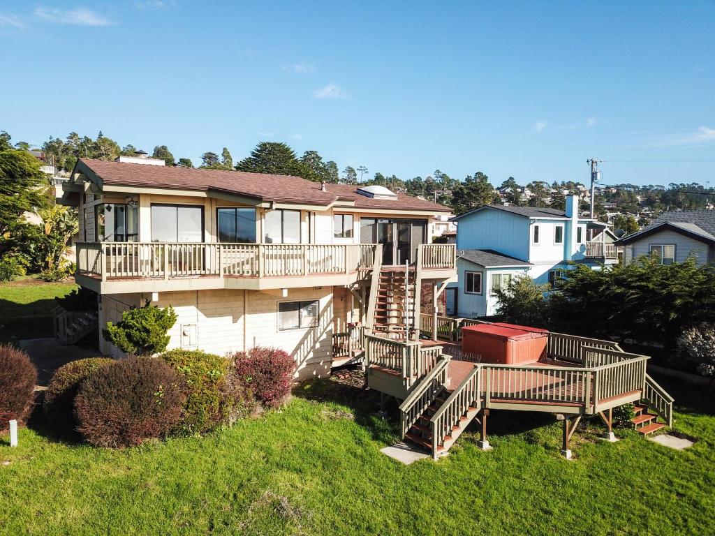 an aerial view of a house with decks at Beachcomber Monthly Only in Cambria