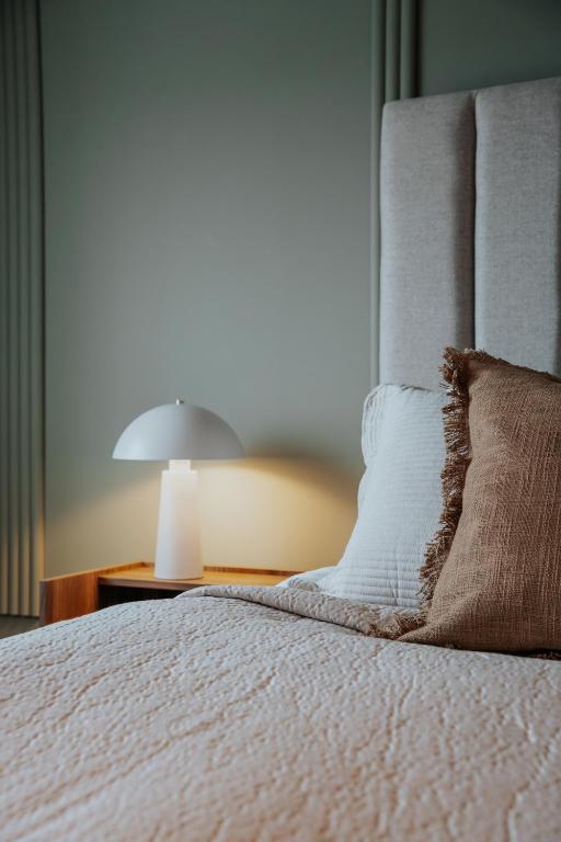 Postel nebo postele na pokoji v ubytování Hotel Vest Mar