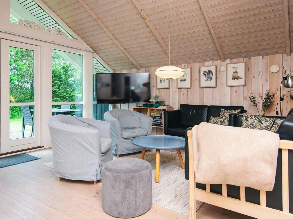 TV a/nebo společenská místnost v ubytování Holiday home Hemmet CCXLVI