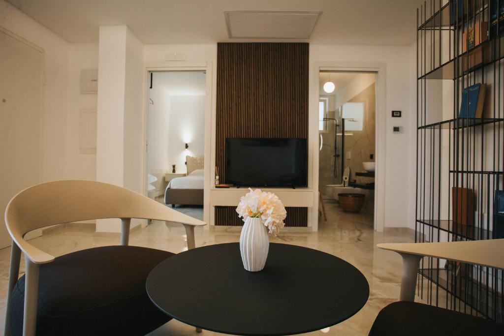 TV a/nebo společenská místnost v ubytování Dalia Suite & Relax