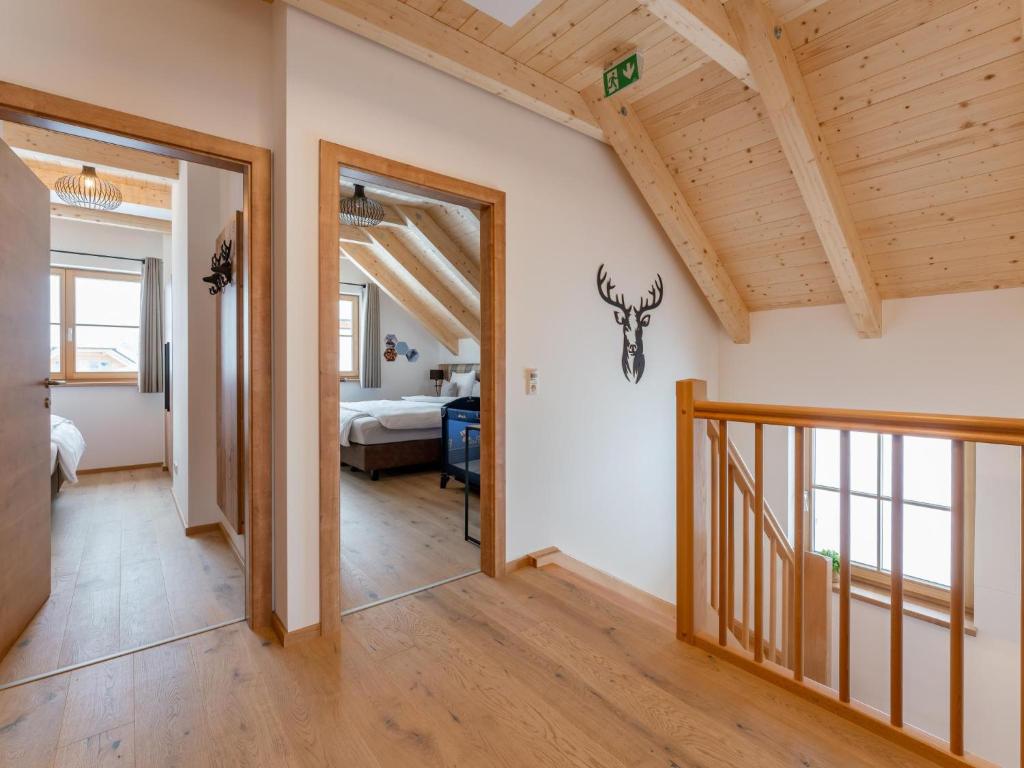 Postel nebo postele na pokoji v ubytování Alpenjoy Lodge