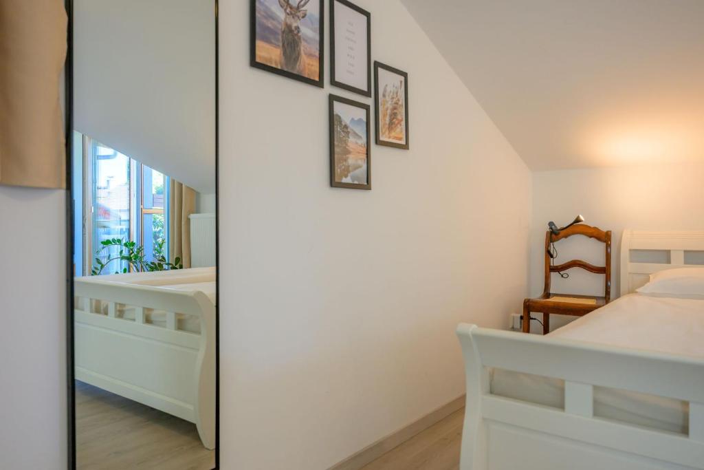 Postel nebo postele na pokoji v ubytování Ferienwohnung Chiemgauglück