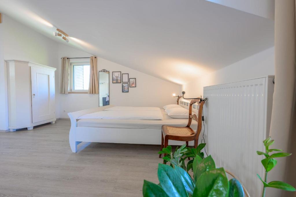 Postel nebo postele na pokoji v ubytování Ferienwohnung Chiemgauglück