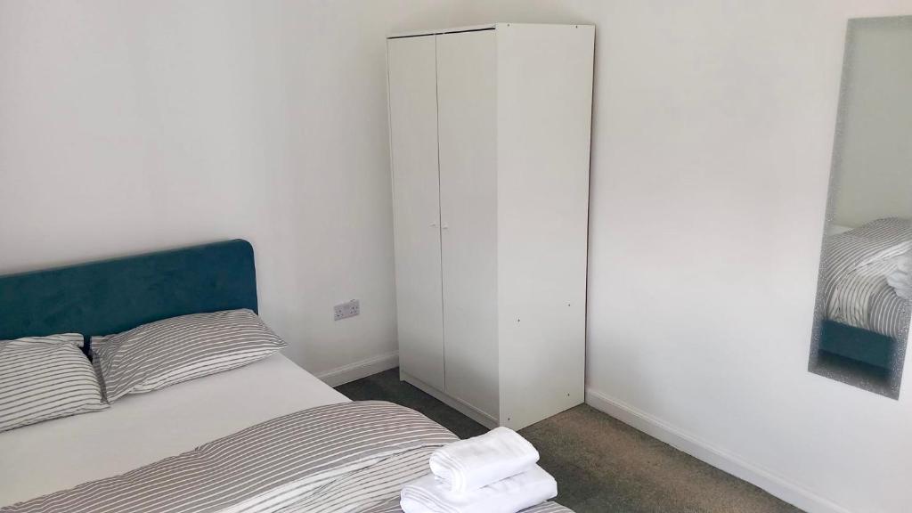 Postel nebo postele na pokoji v ubytování O5 Property