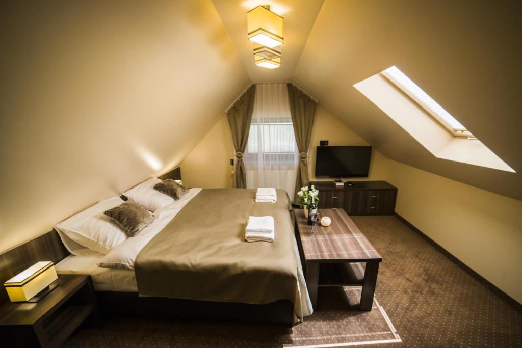 Postel nebo postele na pokoji v ubytování Goprówka