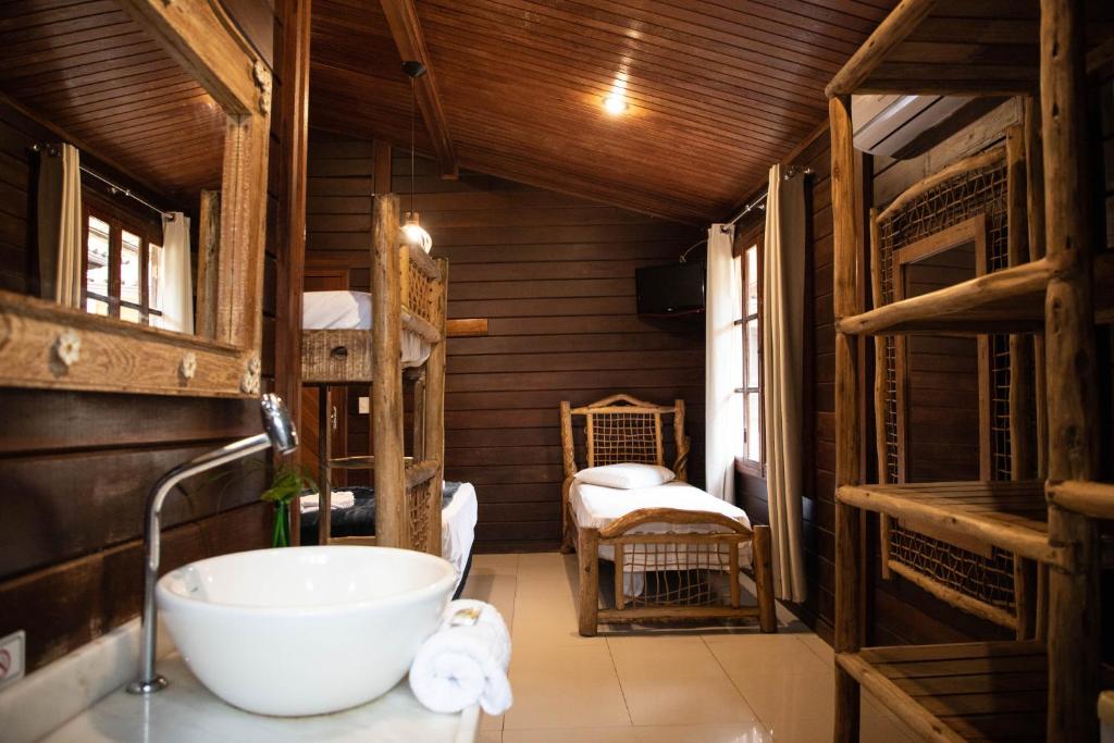 Postel nebo postele na pokoji v ubytování Lonier Nature INN