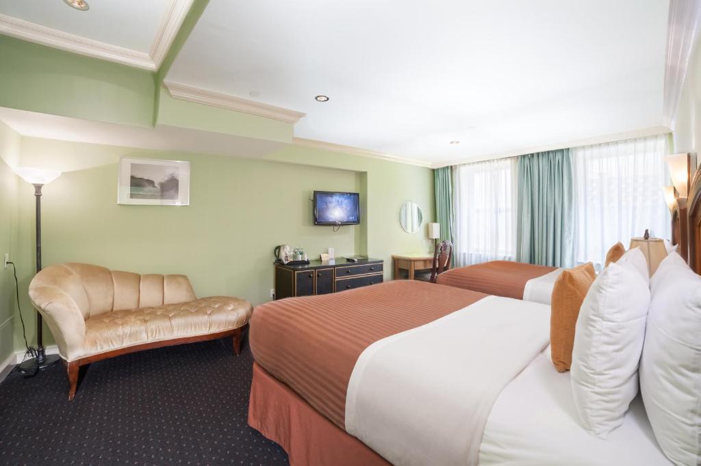 Postel nebo postele na pokoji v ubytování Hotel Mulberry