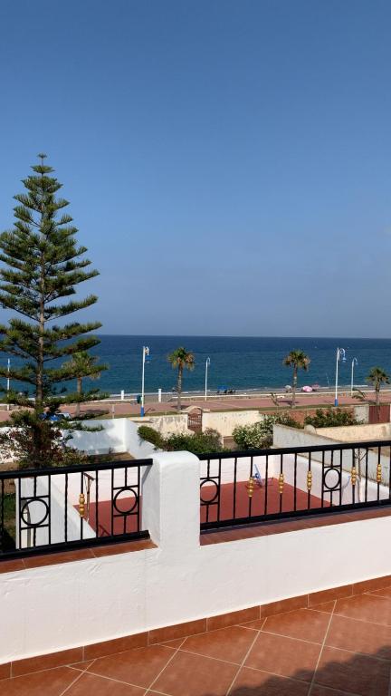 a balcony with a view of the ocean at Mekad in Oued Laou