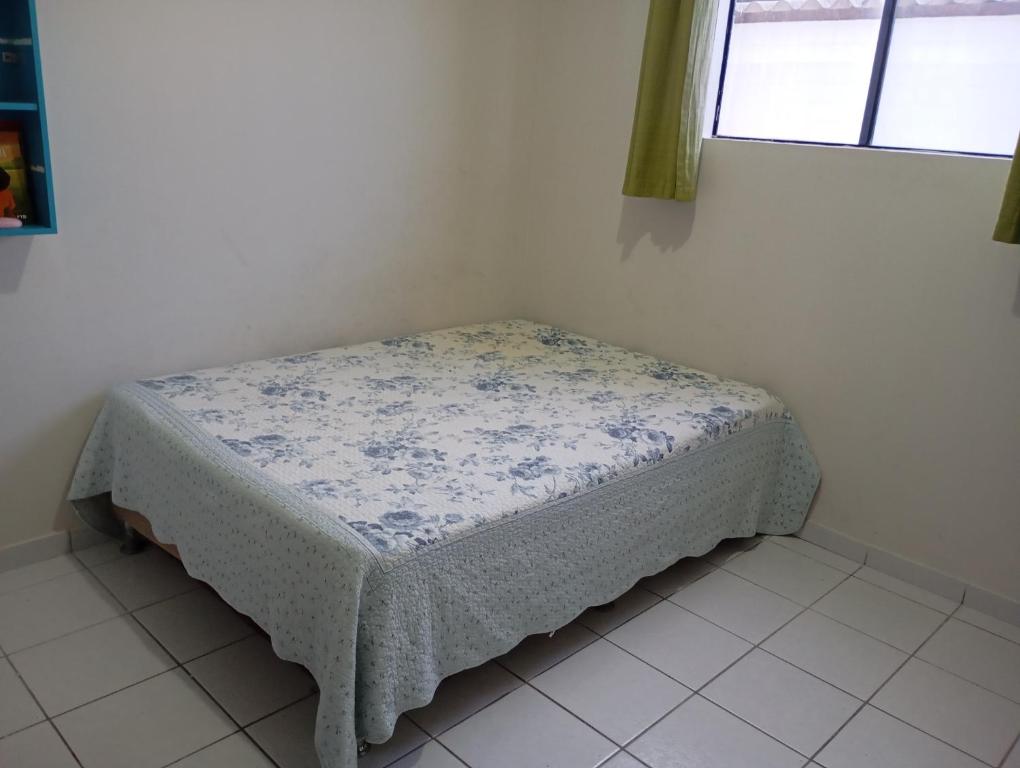 Ένα ή περισσότερα κρεβάτια σε δωμάτιο στο Apartamento próximo ao parque do povo