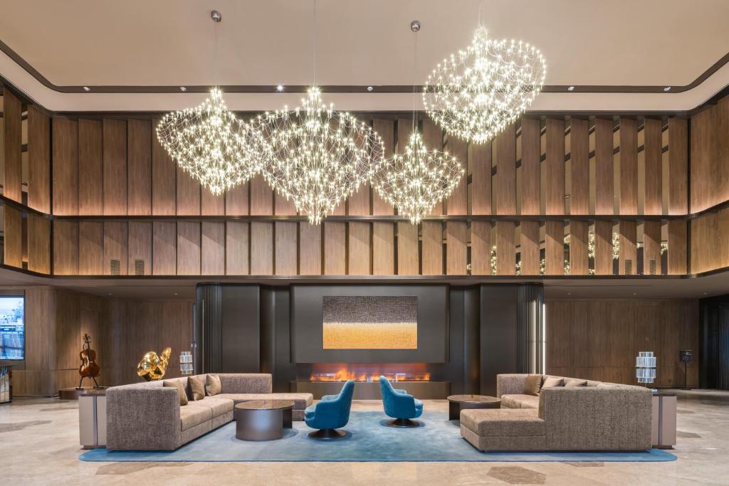 Posezení v ubytování Tianjin Baodi Economic Development Zone Orange Crystal Hotel