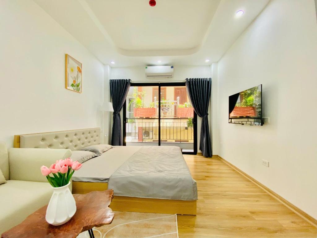 Posezení v ubytování Happy Nest Home - Long Bien