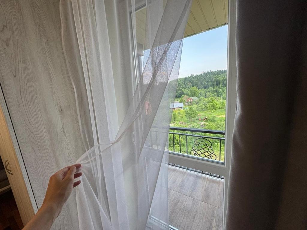 Balkón nebo terasa v ubytování Рута Хелз