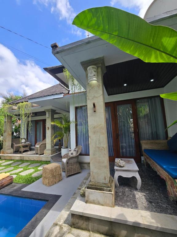 Villa con piscina y casa en Villa Mustika, en Ubud