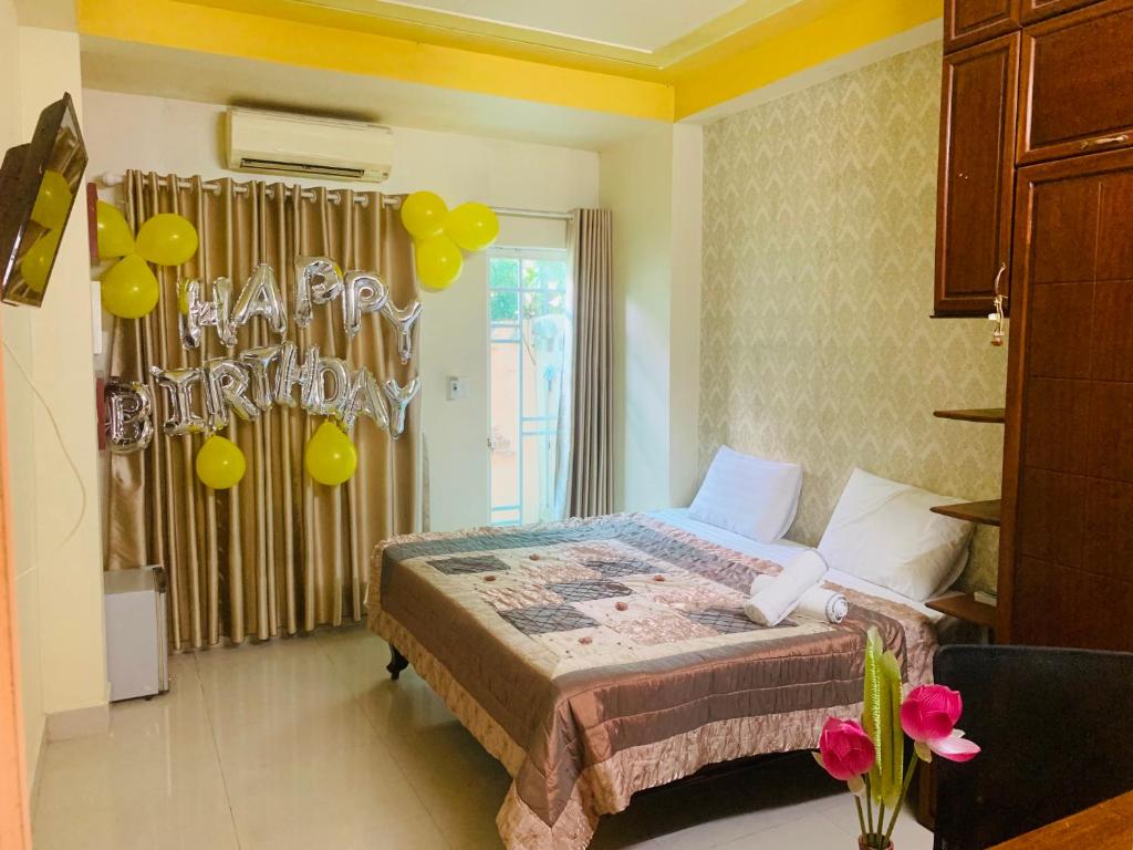 Giường trong phòng chung tại Kota's House Homestay
