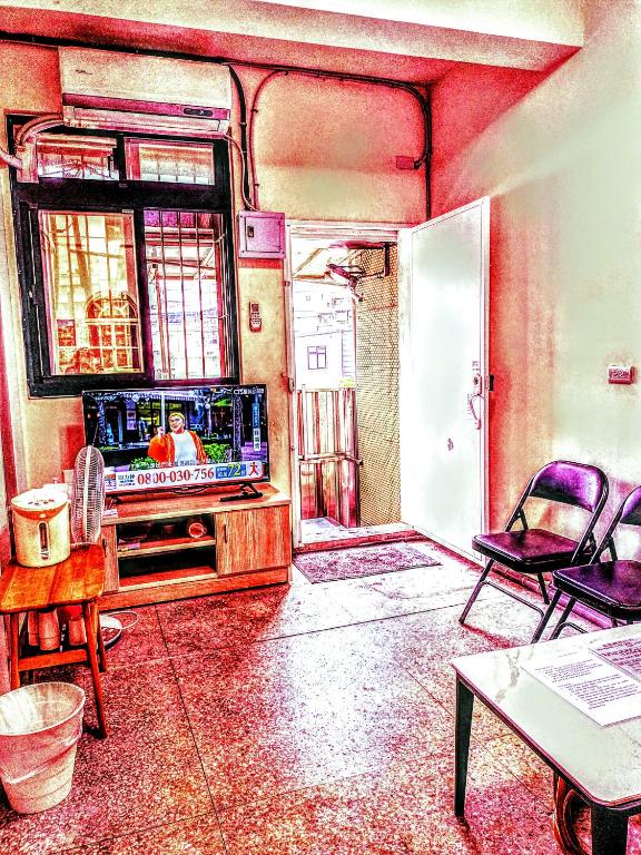 TV a/nebo společenská místnost v ubytování Yun Cheng Homestay