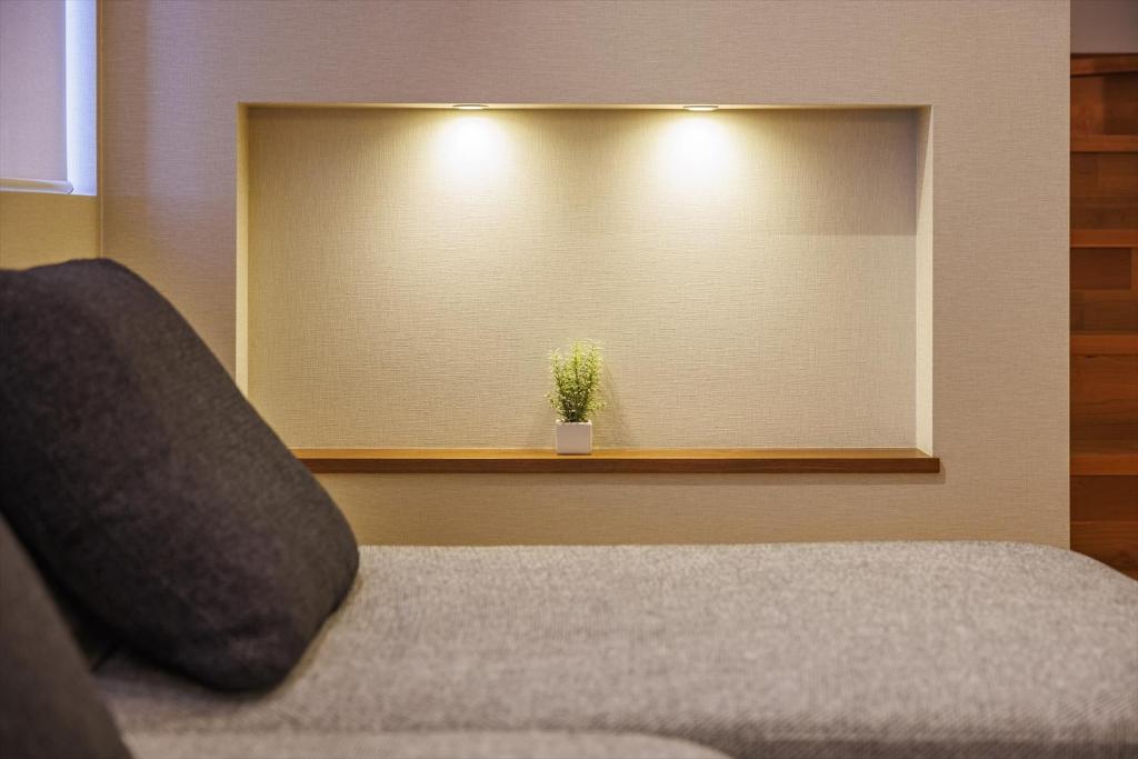Postel nebo postele na pokoji v ubytování villa-rizo 山田