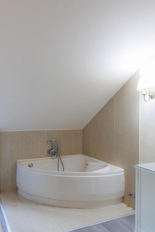 Koupelna v ubytování Hotel Ciudad Cangas de Onis