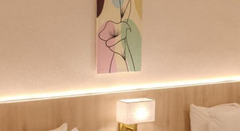 Innspire by Suntai (Previously known as WG Hotel)にあるベッド