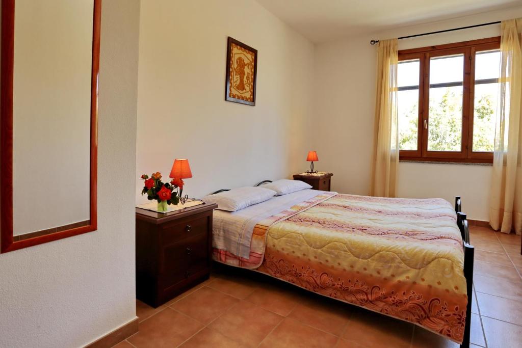 Postel nebo postele na pokoji v ubytování Bed and breakfast Le Camelie