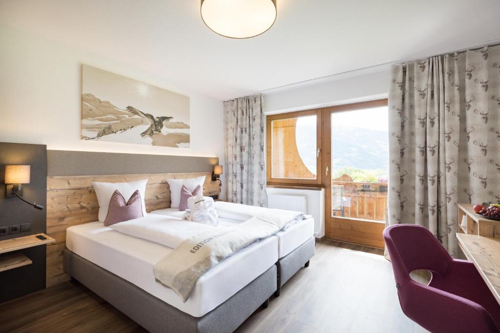 Postel nebo postele na pokoji v ubytování Hotel Pension Wiesenhof