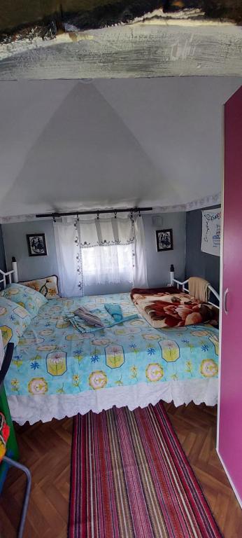 Postel nebo postele na pokoji v ubytování Angelinin Konak