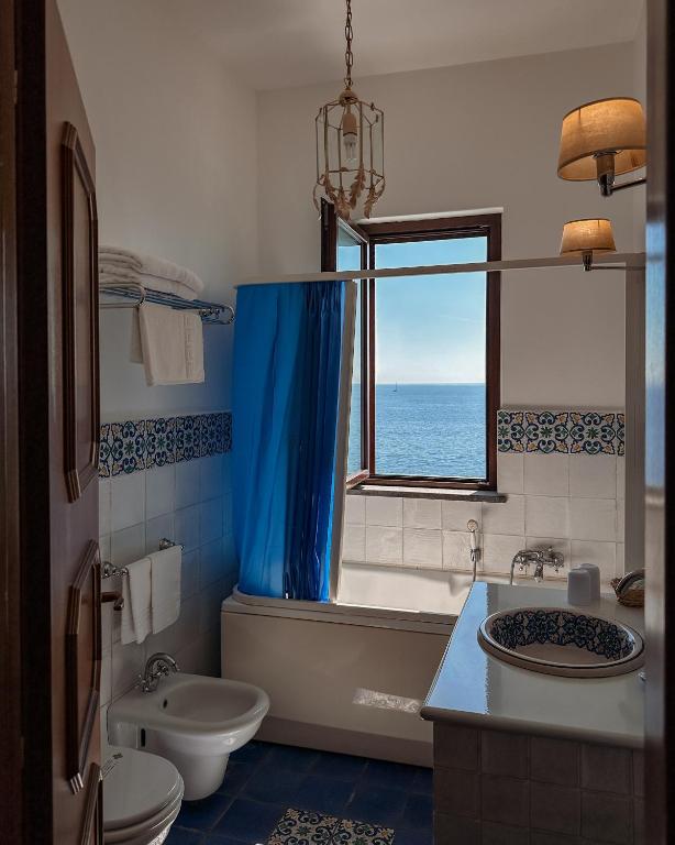 Koupelna v ubytování Hotel Rocce Azzurre