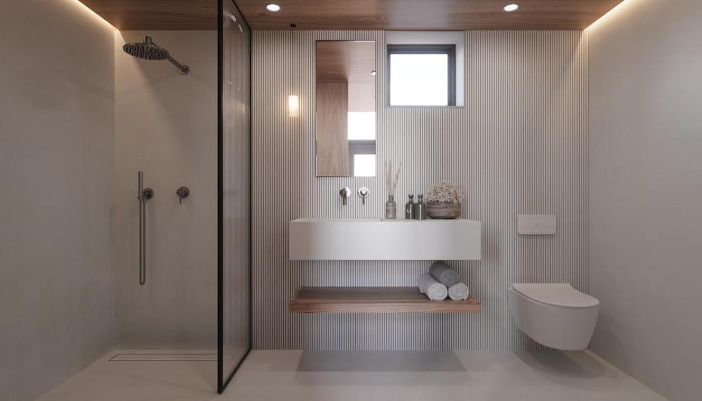 ein Badezimmer mit Waschbecken, Toilette und Dusche in der Unterkunft Winter Getaway Houseboat Stay Romantic in Monnickendam