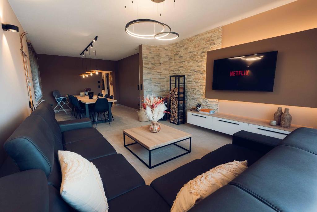 Posezení v ubytování Chalet de Botrange