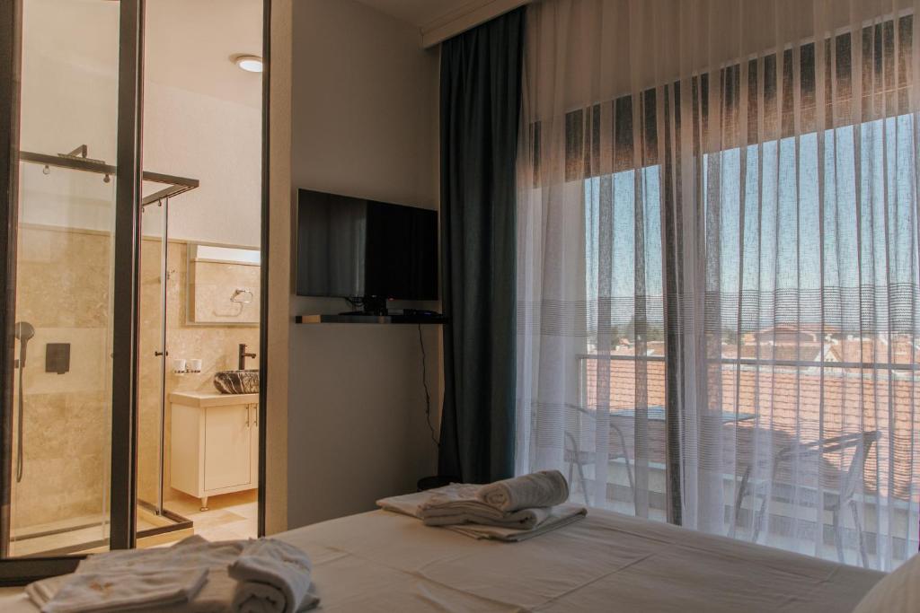 Postel nebo postele na pokoji v ubytování Hermosa Hotel