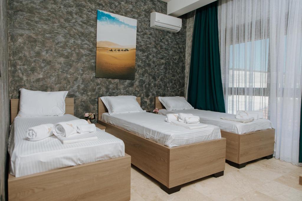 Postel nebo postele na pokoji v ubytování Hermosa Hotel